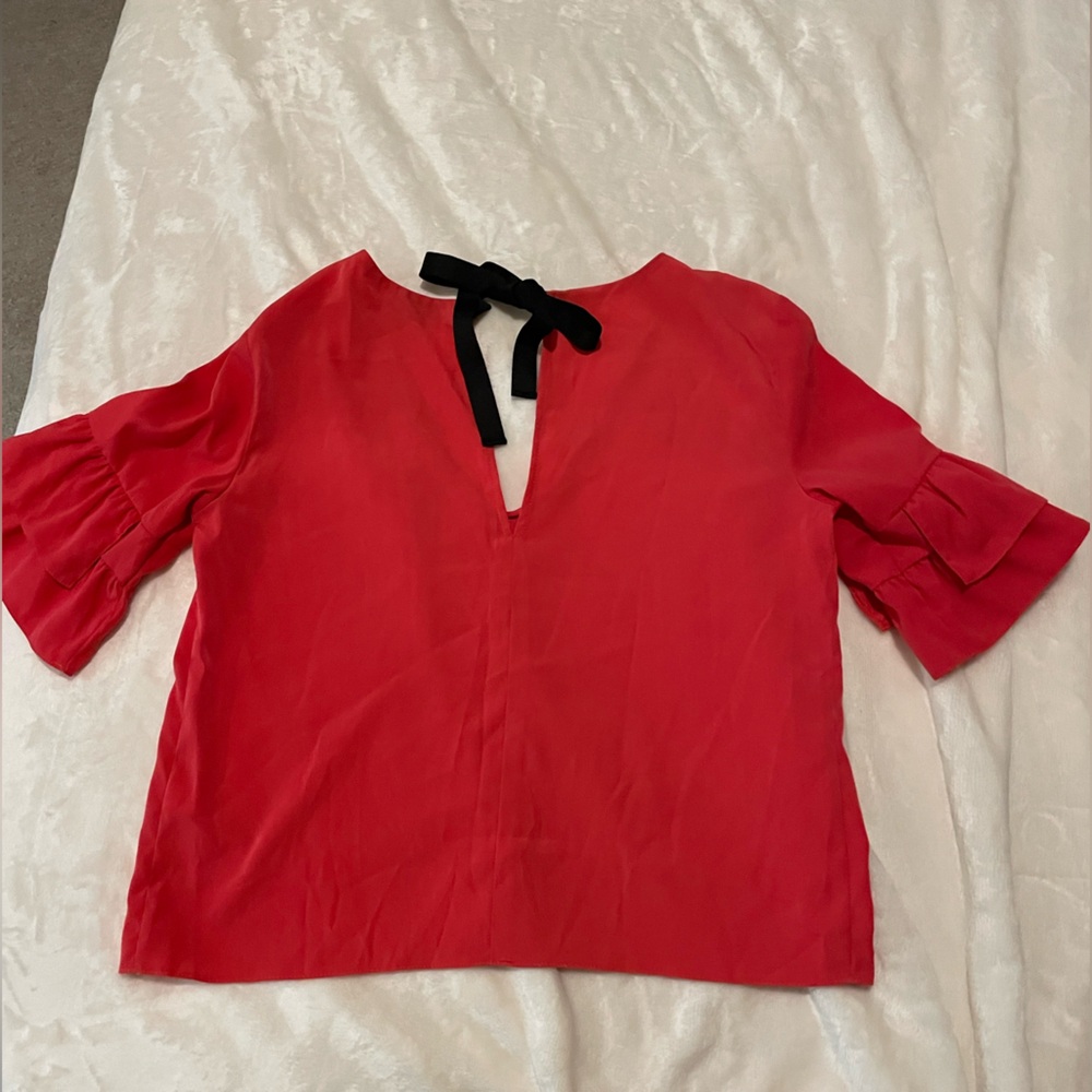 Topshop blouse with ruffle sleeves and tie back